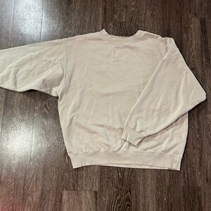 size medium cream colored crew neck sweatshirt
